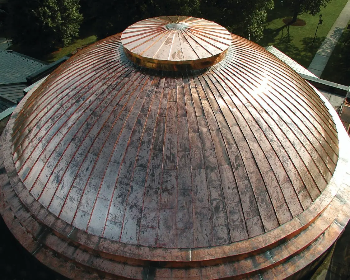 Craftsman Roofing crew installing a new roof in Saddle Rock Golf Club